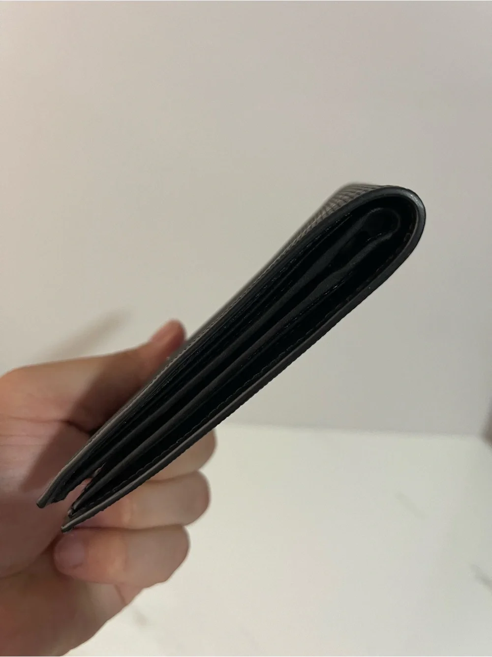 Giuseppe Zanotti Black Textured Bi-Fold Wallet with Metal Signature